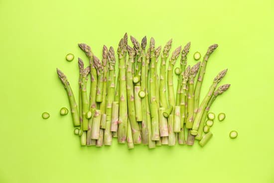 canva fresh asparagus on green background MAD8y9B60ok