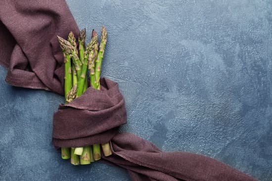 canva fresh asparagus on grey background MAD8y0V3V9E