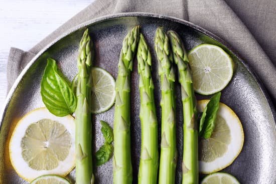 canva fresh asparagus on pan MAD Ma UmBw