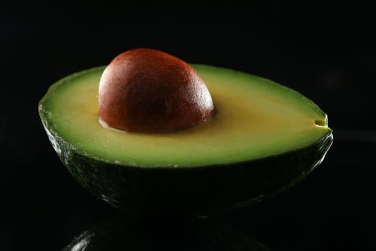 canva fresh avocado on black background MAD QppzlNY