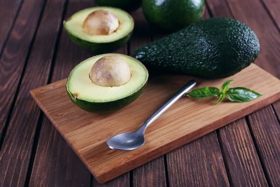 canva fresh avocado on cutting board MAD QoYRN6o