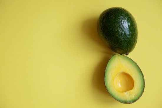 canva fresh avocado on yellow background MAD QgOJMkA