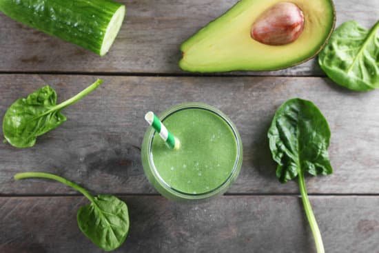 canva fresh avocado smoothie on the table MAD Qm8k8zk