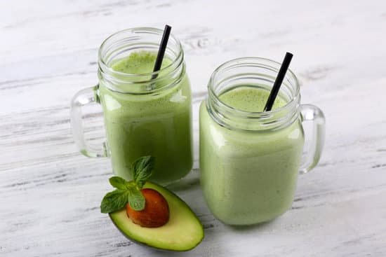 canva fresh avocado smoothie on white wooden background MAD Qj58QJM
