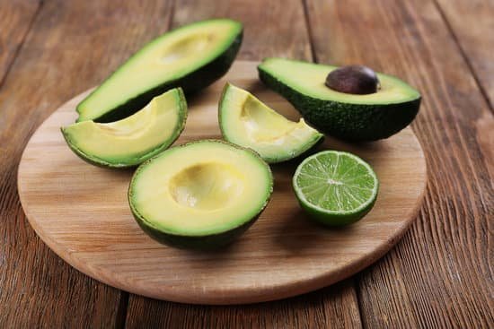 canva fresh avocado with lime on cutting board MAD Qv0DNJM