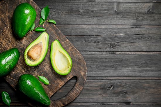 canva fresh avocados on wooden board MAEP51rl0B8