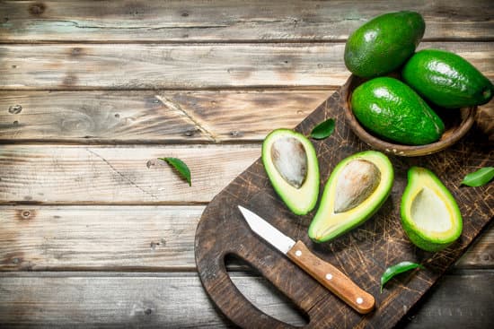 canva fresh avocados on wooden board MAEP5g 2jVc