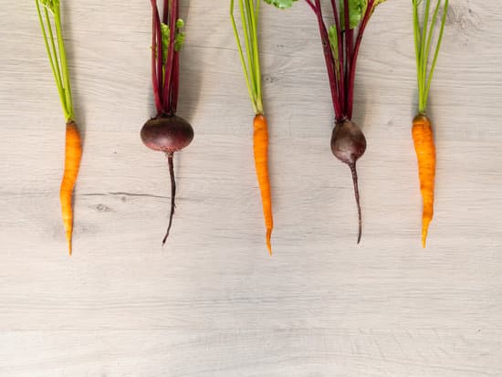 canva fresh beautiful washed beets and carrots. layout top view MAEO0j1j EQ