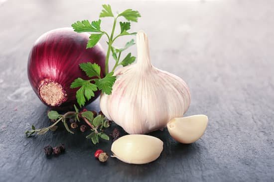 canva fresh garlic and onion on grey background MAD8Sl7c96g