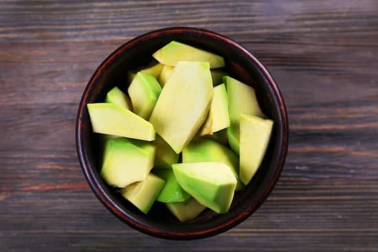 canva fresh sliced avocado in a black bowl MAD Qh0KHlg