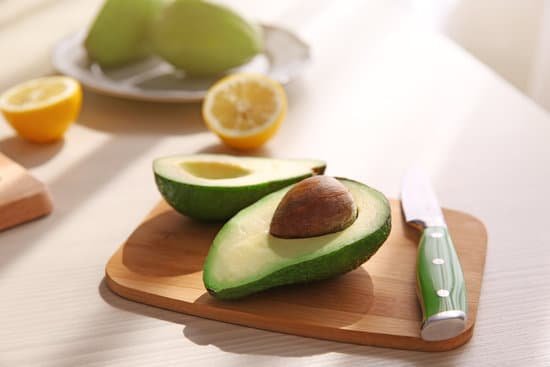 canva fresh sliced avocado on cutting board MAD Qtu1Nhg