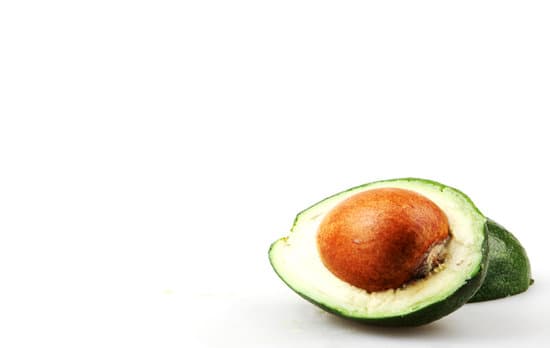 canva fresh sliced avocado on white background MAEQRK28krA