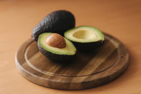 canva fresh sliced avocado on wooden board. MAERFQyk 2Q