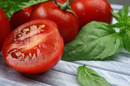 canva fresh tomatoes with basil on wooden table MAD MS6qQ5Y