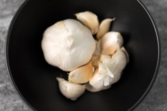 canva garlic in a bowl up close MAERHY2hdFY