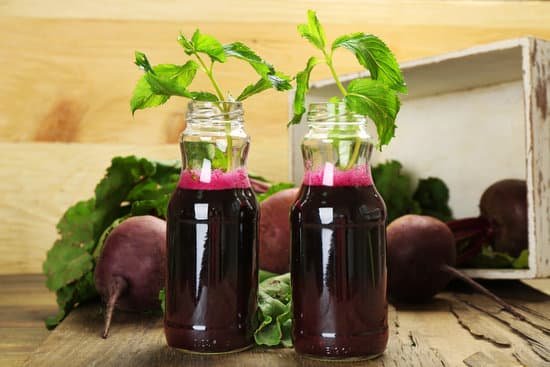 canva glass bottles with fresh beet juice MAD MTTQNjs