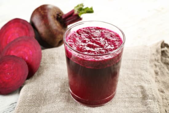 canva glass of beet juice with vegetables on sackcloth MAD MZNFhgQ
