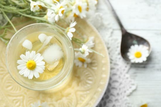 canva glass of cold chamomile tea with ice cubes MAD MR TBGo