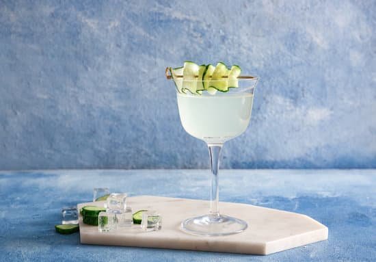 canva glass of cucumber martini on a marble board MAD7pC8T