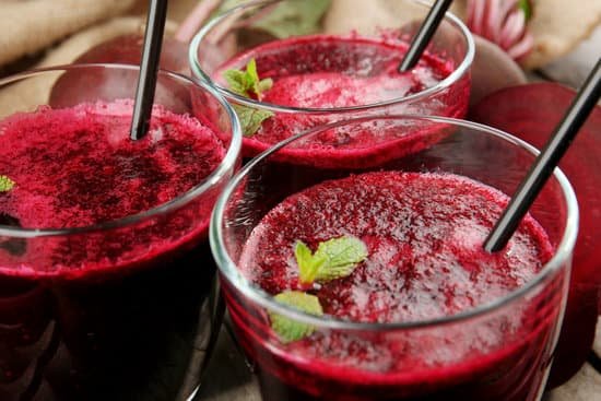 canva glasses of beet juice closeup MAD MWlHbY4