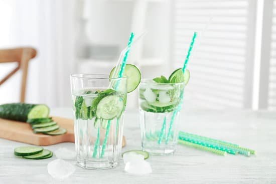 canva glasses of fresh cucumber lemonade on table MAD9bIsWeSU