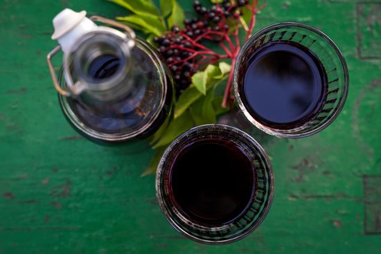 canva glasses of fresh elderberry syrup and elderberries MADFlgfmmKs