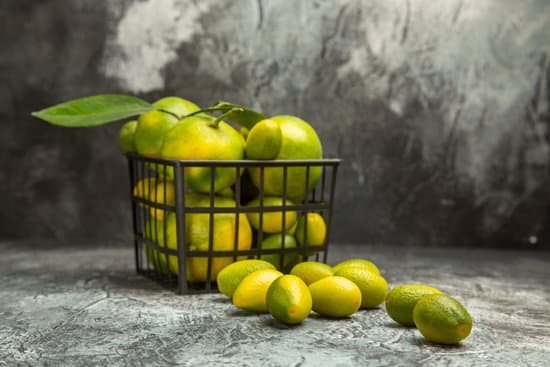 canva green tangerines and kumquats in a basket MAEQpD69e o