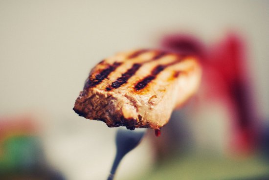 canva grilled meat on silver colored fork MADGyT6LJoc