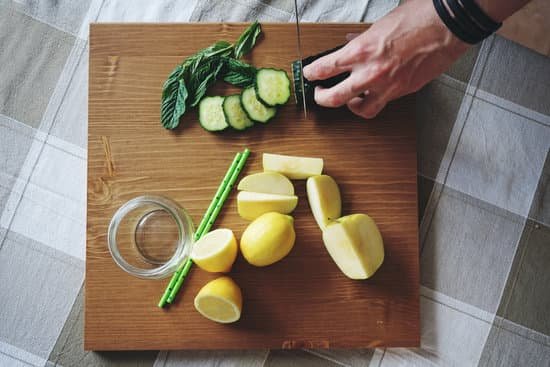 canva hands cutting cucumber and fruits MAC8qBNY N4