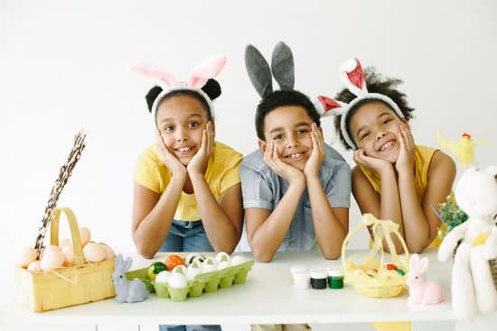 canva happy kids posing for a photo in rabbit ears MAEantSSJLk