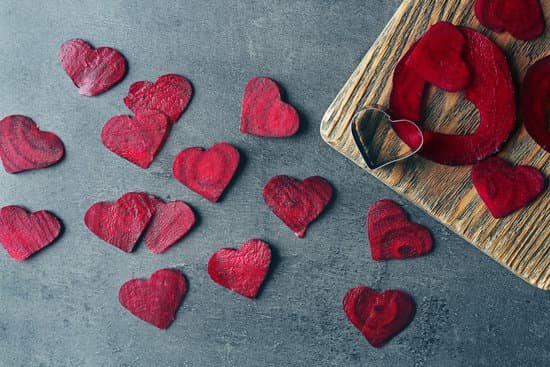 canva heart shape beet slices on gray table MAD Q4N4vc4