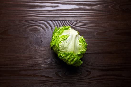 canva iceberg lettuce on a table MAEAGPuClCw