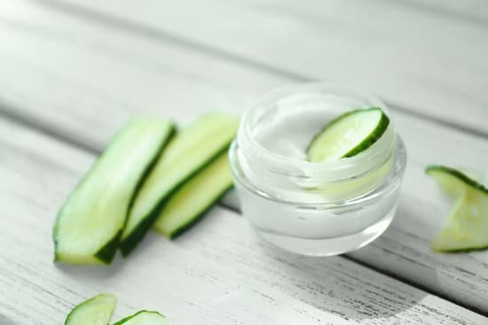 canva jar with cucumber cream on table MAD9TysoOX0