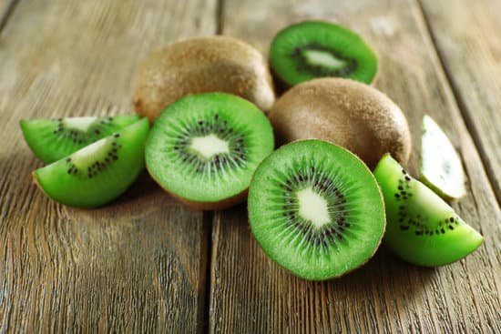 canva juicy kiwi fruit on wooden surface MAD Mbf6Dew