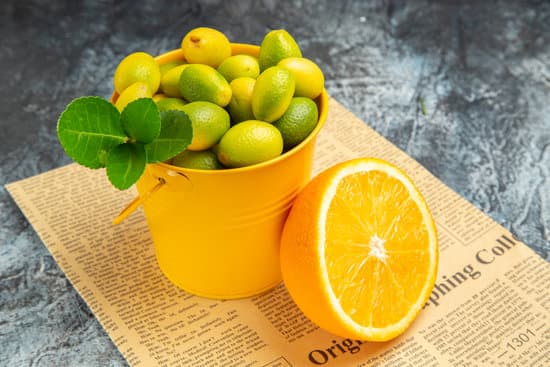 canva kumquats in a bucket and a slice of orange MAEQk79j48I