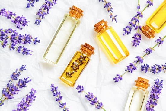 canva lavender essential oil in small glass bottles on white background MAECgEGgYek