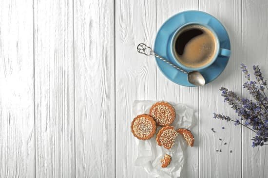 canva lavender with coffee and cookies on wooden background MAD Q3QXe2Q