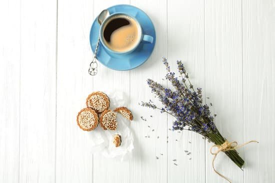 canva lavender with coffee and cookies on wooden background MAD Q4G i84