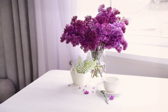 canva lilac and may lily bouquets on white table MAD Qmuonfc