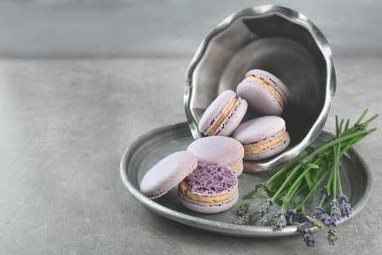 canva macaroons and lavender on table MAD Q5vBqQ4