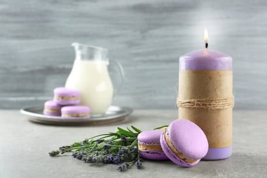 canva macaroons milk lavender and candle on table MAD Q6eoE0I