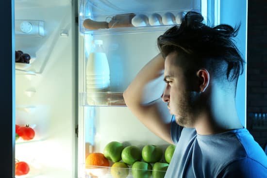 canva man choosing food in kitchen. hunger concept MAEsegBd rQ