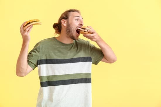 canva man with problem of strong hunger on color background. diabetes symptoms MAEMOuh2a s