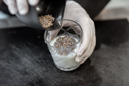 canva mixing milk with lavender seeds for flavor MAECf3CJJ30