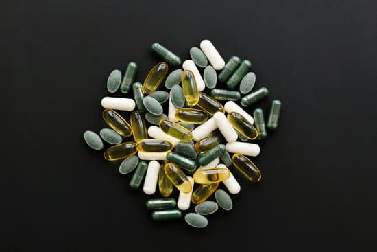 canva omega 3 spirulina chlorophyllmagnesium capsules on black dar MAEYTaqe7m0