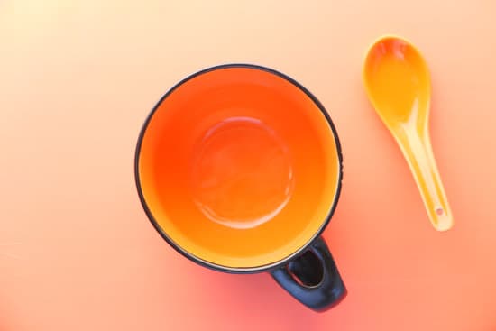 canva orange color a bowl and spoon orange background MAEQfMmUvLI