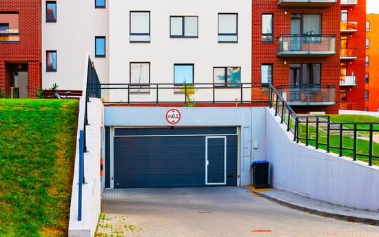 canva parking garage entrance of modern residential apartment building MAD7ErygSbY