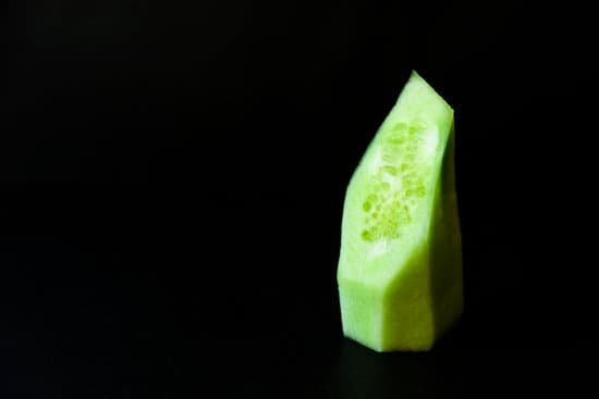 canva peeled cucumber on black background MAD9ilpTZ1c