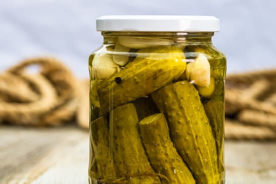 canva pickled cucumber in glass jar MAEPy S3kHM