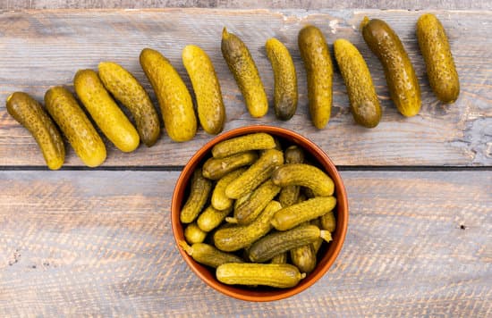 canva pickled cucumbers in a bowl MAD gYEYRTE